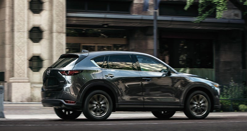 Grey 2020 Mazda CX-5 Driving on the road | Flood Mazda in Wakefield, RI