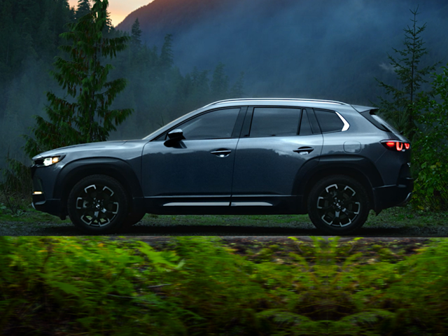 A Mazda CX-50 driving outside