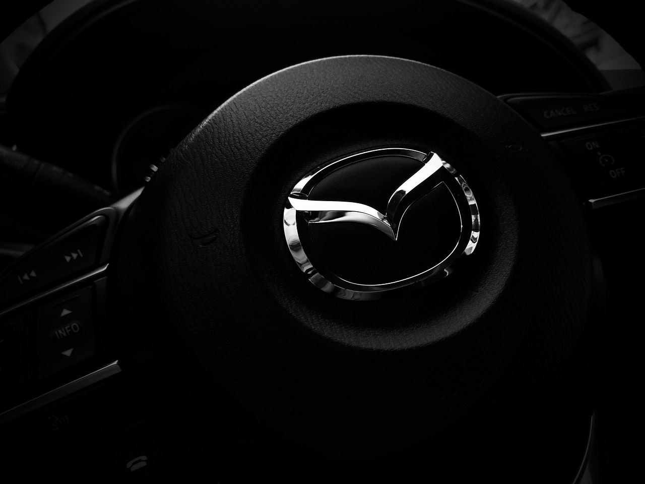 A Mazda steering wheel