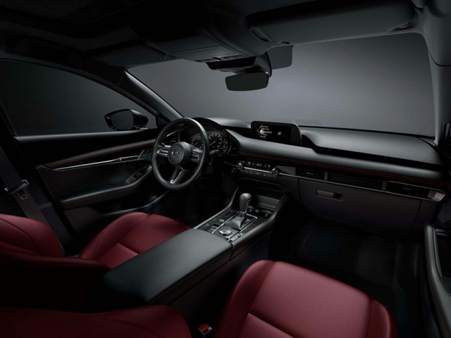 The front and passenger seat of Mazda vehicle