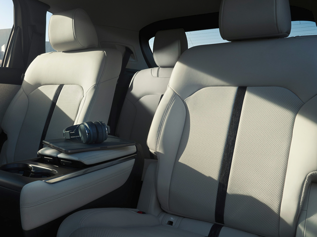 The back and middle car seats of a SUV vehicle