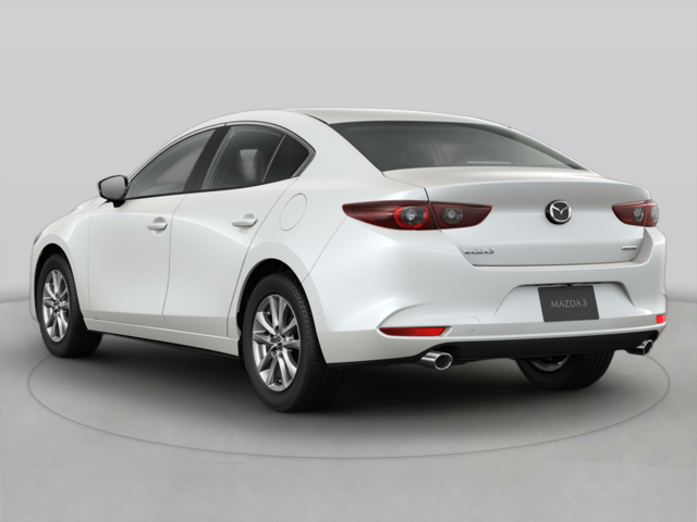 A white Mazda sedan